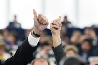 caption: Seattle women with advanced degrees earned 68 cents on the dollar that men made in 2015. Women with high school degrees were closer to parity with men of their education level in the city.