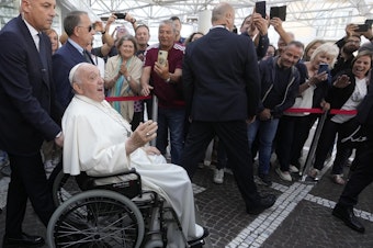 caption: Pope Francis leaves the Agostino Gemelli University Polyclinic in Rome, on Friday, nine days after undergoing abdominal surgery.