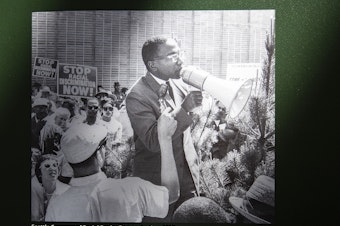 caption: A portion of the "Confronting Hate Together" exhibit, a historical photograph from 1963, is shown on Tuesday, May 14, 2024, at the Wing Luke Museum in Seattle. 