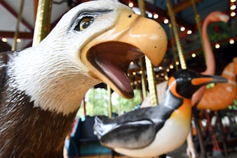 caption: As of Wednesday, you won't be able to ride this bald eagle at the carousel at the Smithsonian National Zoo in Washington, D.C. The zoo and Smithsonian museums closed to the public because of the partial government shutdown.