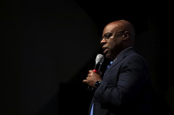 caption: Seattle Public Schools Superintendent Brent Jones discusses a proposed plan to close 20 elementary schools on Tuesday, May 28, 2024, at Roosevelt high school in Seattle. 