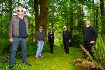 caption: Tom Dyer (far right) with his band The True Olympians