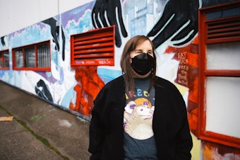 caption: Roz Martinez is portrayed on Thursday, April 3, 2025, in Seattle’s University District. 