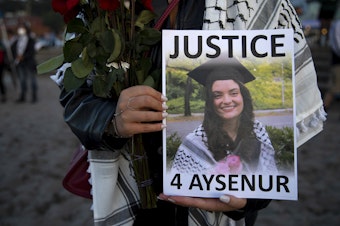 caption: Hundreds gathered for a vigil in honor of Aysenur Ezgi Eygi, a 26-year-old Turkish American activist who was killed by Israeli soldiers while participating in an anti-settlement protest in the occupied West Bank, on Wednesday, September 11, 2024, at Alki Beach Park in Seattle. 