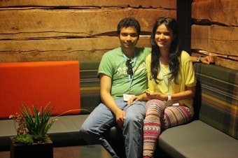 caption: Vikram and Upasana Kone at a restaurant in San Francisco, where the couple visited his brother last summer.