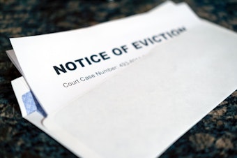 caption: Washington state, and King County, is experiencing a surge in eviction cases. Tenant advocates say this is a good thing, showing that the state's new program providing attorneys to low-income residents is working. Landlord advocates, however, argue that it's forcing simple problems into complex court proceedings. 