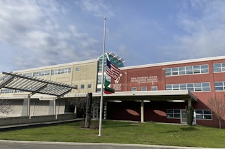 caption: The John Stanford Center for Educational Excellence, Seattle Public School headquarters, on Feb. 27, 2021.