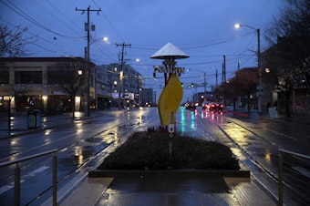 caption: Seattle’s Little Saigon neighborhood is shown as the sun goes down on Thursday, March 20, 2025, in Seattle. 
