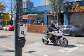 caption: Crosswalk speakers at the corner of 43rd street and University Ave were hacked to play an audio deepfake of Amazon founder Jeff Bezos.