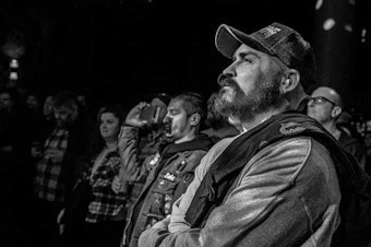 caption: KUOW announcer Kevin Diers doing one of the things he loved most, going to shows and hearing live music in Seattle. 