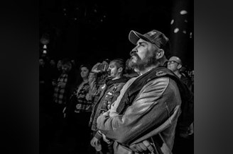 caption: KUOW announcer Kevin Diers doing one of the things he loved most, going to shows and hearing live music in Seattle. 