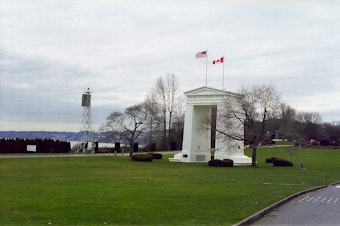caption: The Peace Arch memorial monument in Blaine, Washington connects the U.S. and Canada as a port of entry. 