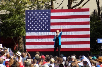 caption: Massachusetts Senator Elizabeth Warren (D) at a campaign town hall at Seattle Center on Sunday, August 24th.