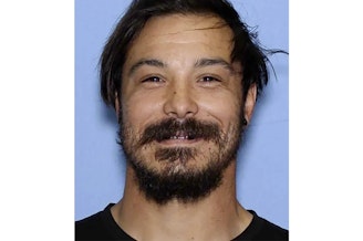 caption: This undated photo provided by the Wenatchee Police Department shows Travis Caleb Decker who the police are asking the public for help in locating the Washington state father who is wanted for murder after his three young daughters were reported missing and then found dead. 