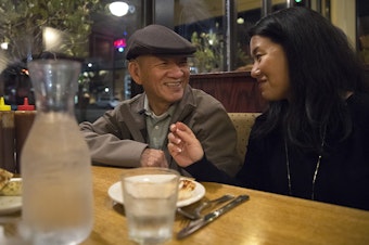 caption: Duc Tan, left, and his daughter, Thanh Tan, laugh while eating at Ramblin Jack's Restaurant on Friday, September 29, 2017, in Olympia. KUOW Photo/Megan Farmer