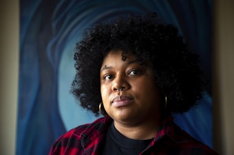 caption: Shemona Moreno, executive director of 350 Seattle, is portrayed at her home on Friday, Nov. 22, 2024, in Seattle. Moreno is an REI member seeking a nomination for REI’s board. 