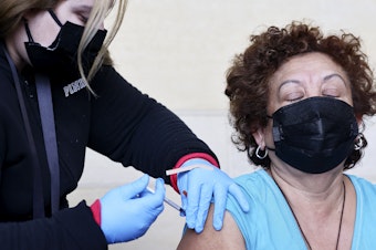 caption: New COVID-19 vaccines received the backing of a panel of Centers for Disease Control and Prevention Tuesday. The shots will be available across the country later this week.