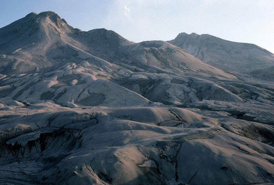 caption: Ash covers the desolate landscape of Mount St. Helens on June 9, 1983.