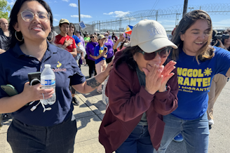caption: University of Washington employee and Filipina green card holder Lewelyn Dixon (center) was released from the Tacoma ICE center on Thursday, May 29, 2025 after being in detention for several months. 